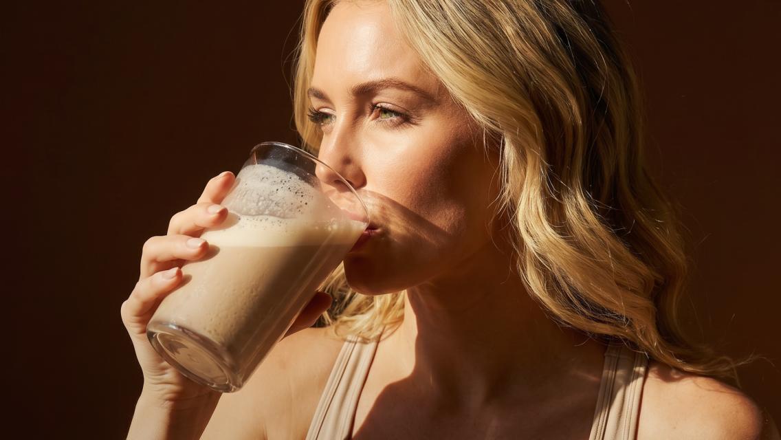 woman drinking shake