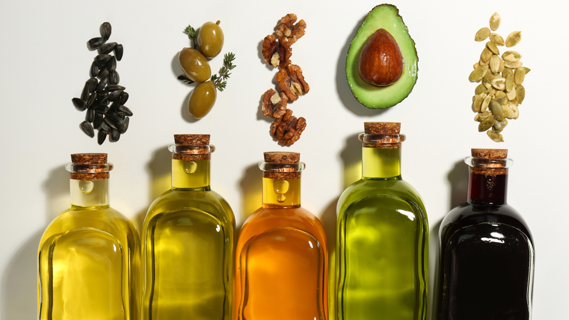 bottles of healthy oils and fats