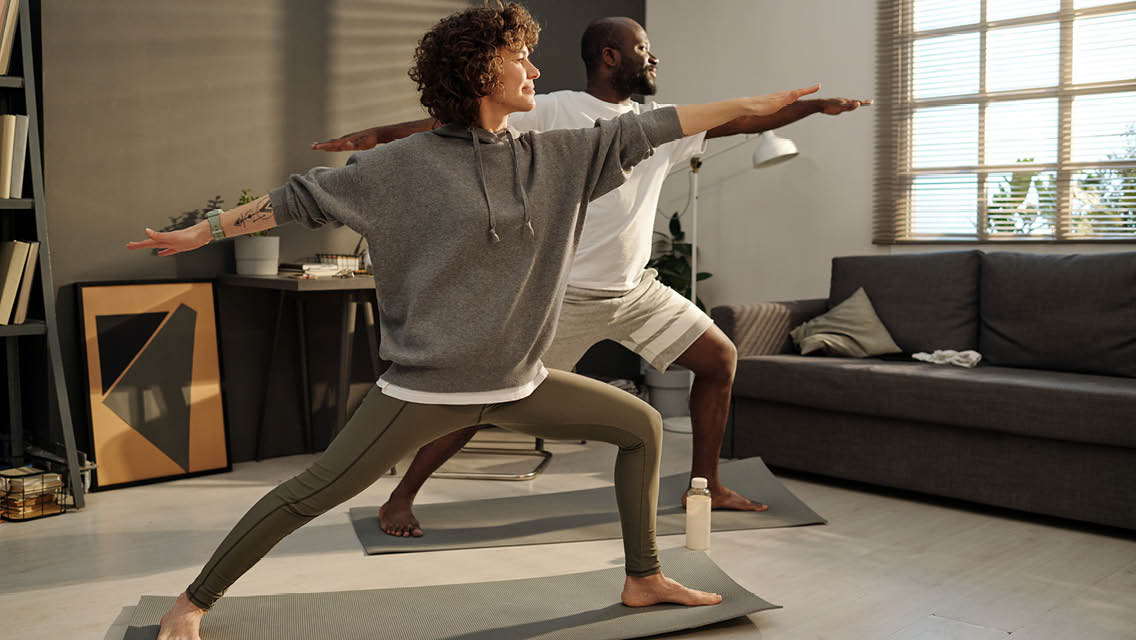 people doing yoga at home