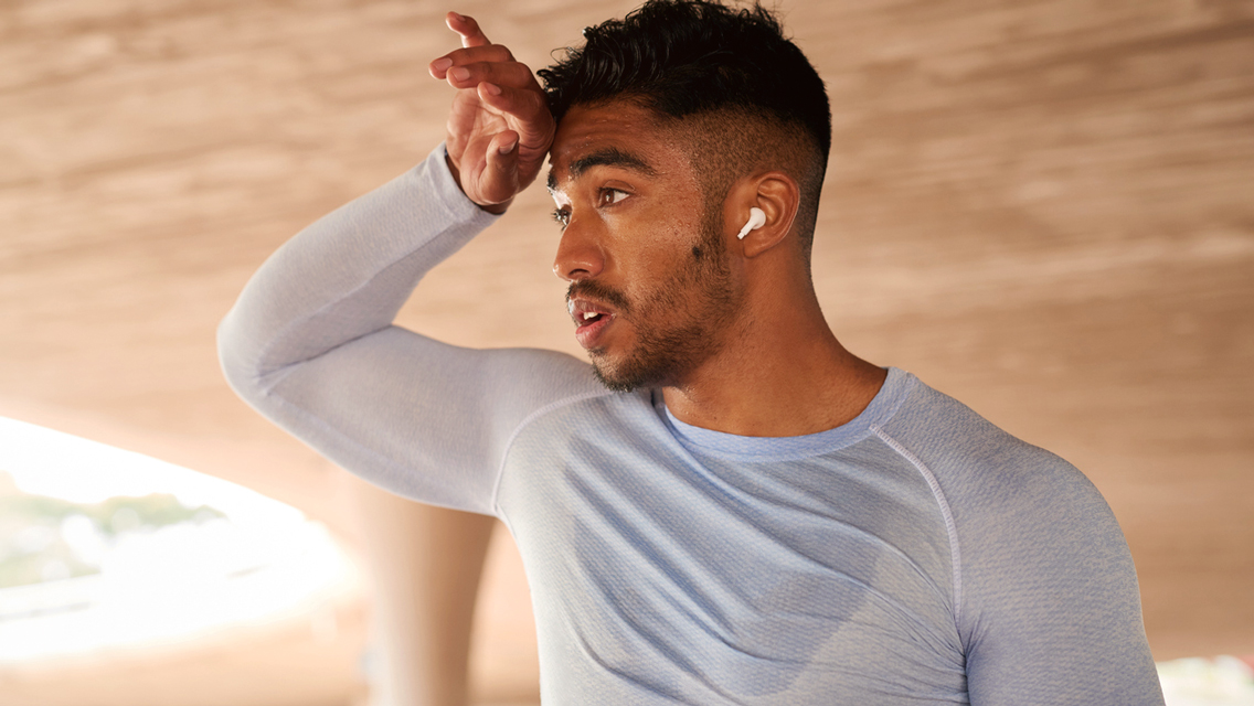 a man with a sweaty shirt