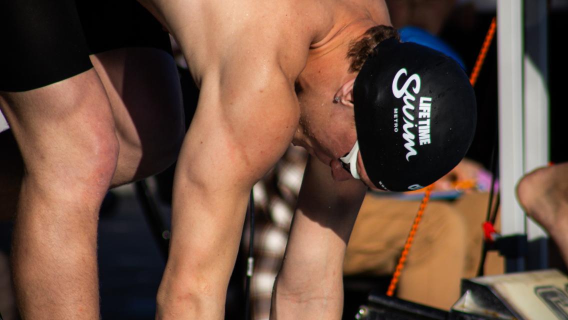 jordan raglund with swimcap on ready to start a race
