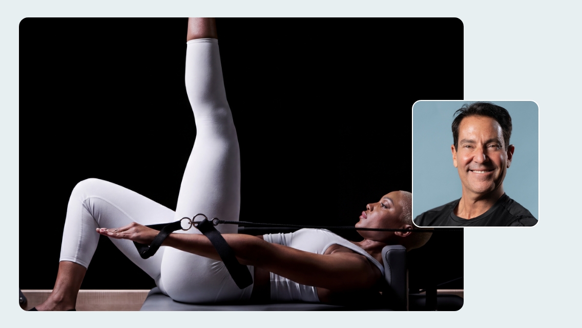 Member doing a move on a reformer.