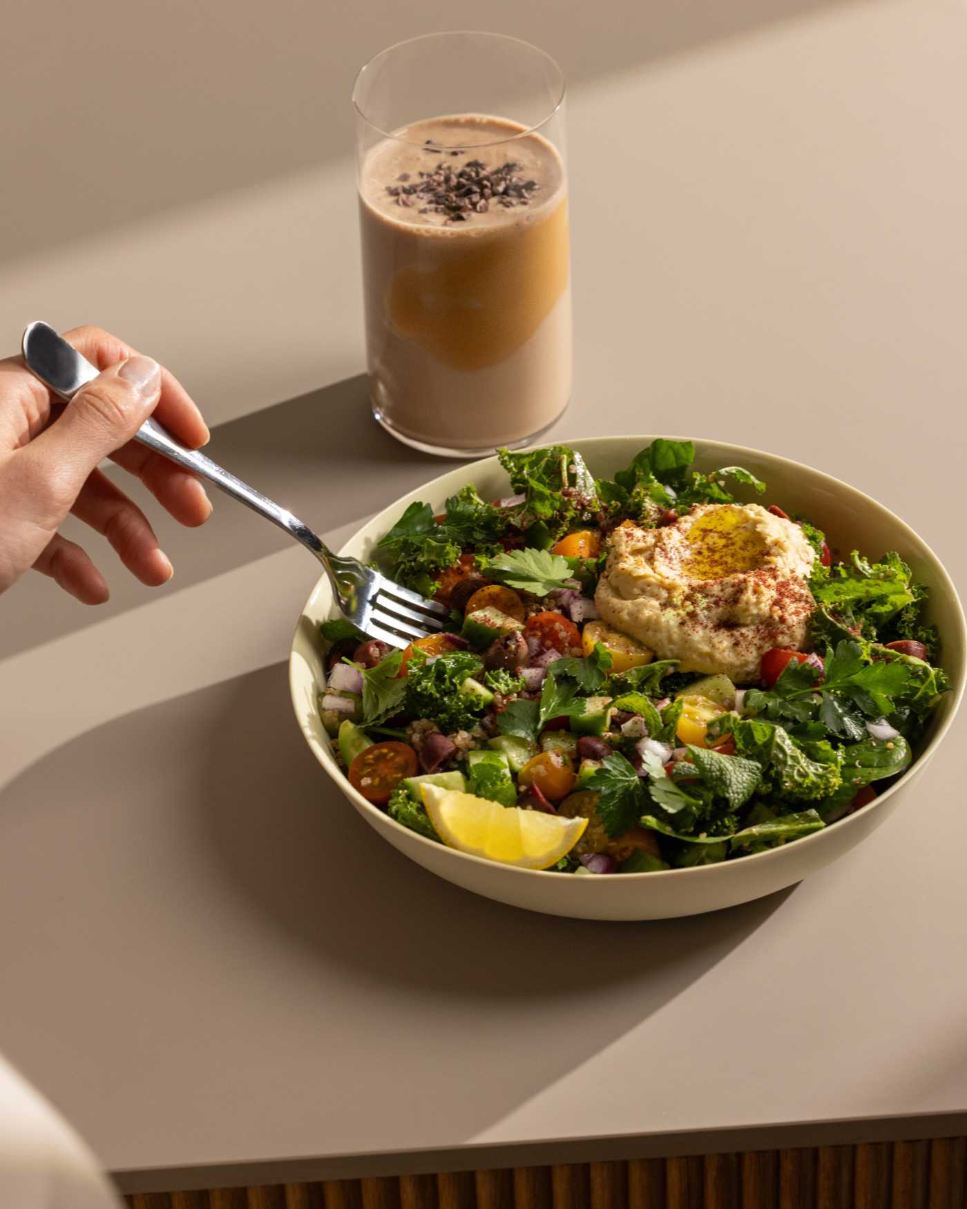 A healthy salad and a protein shake.