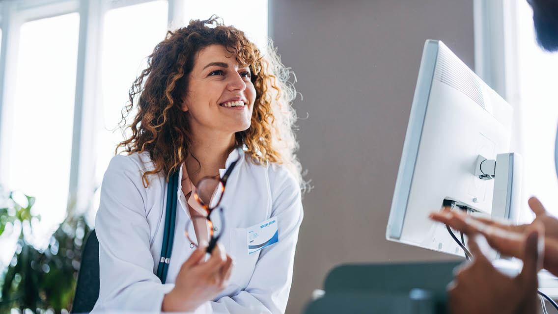 a health practitioner engages with a client