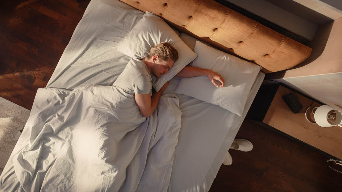 a person sleeping in bed