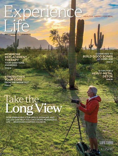 September/October 2026 cover Experience Life. Man photographing cactus