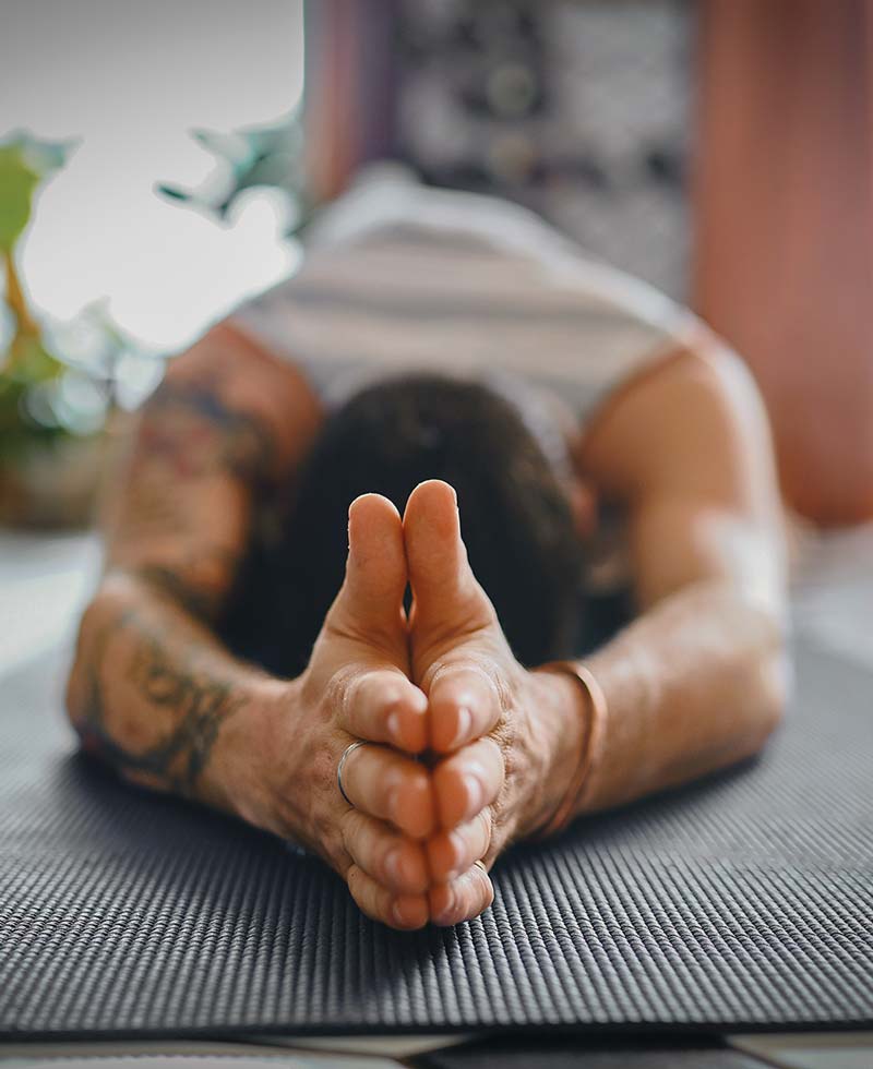 man on a yoga mat