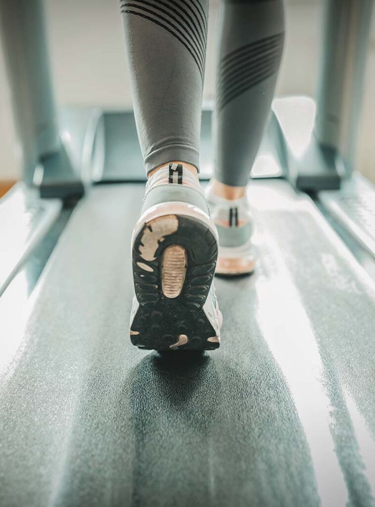 feet on a treadmill