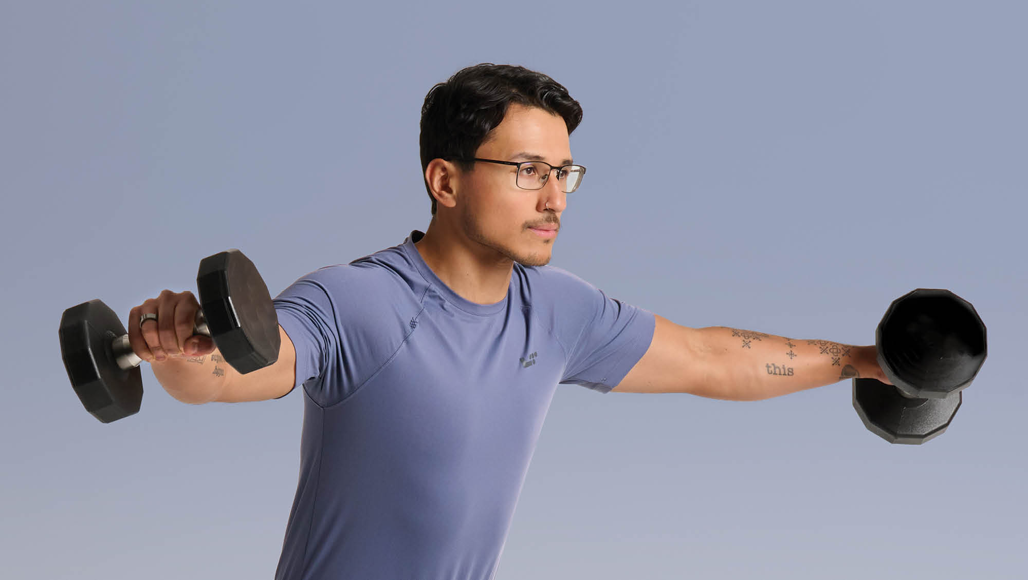 man performing a lateral raise