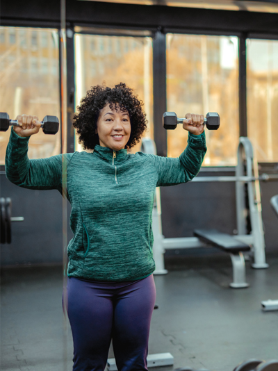 a woman lifting weights