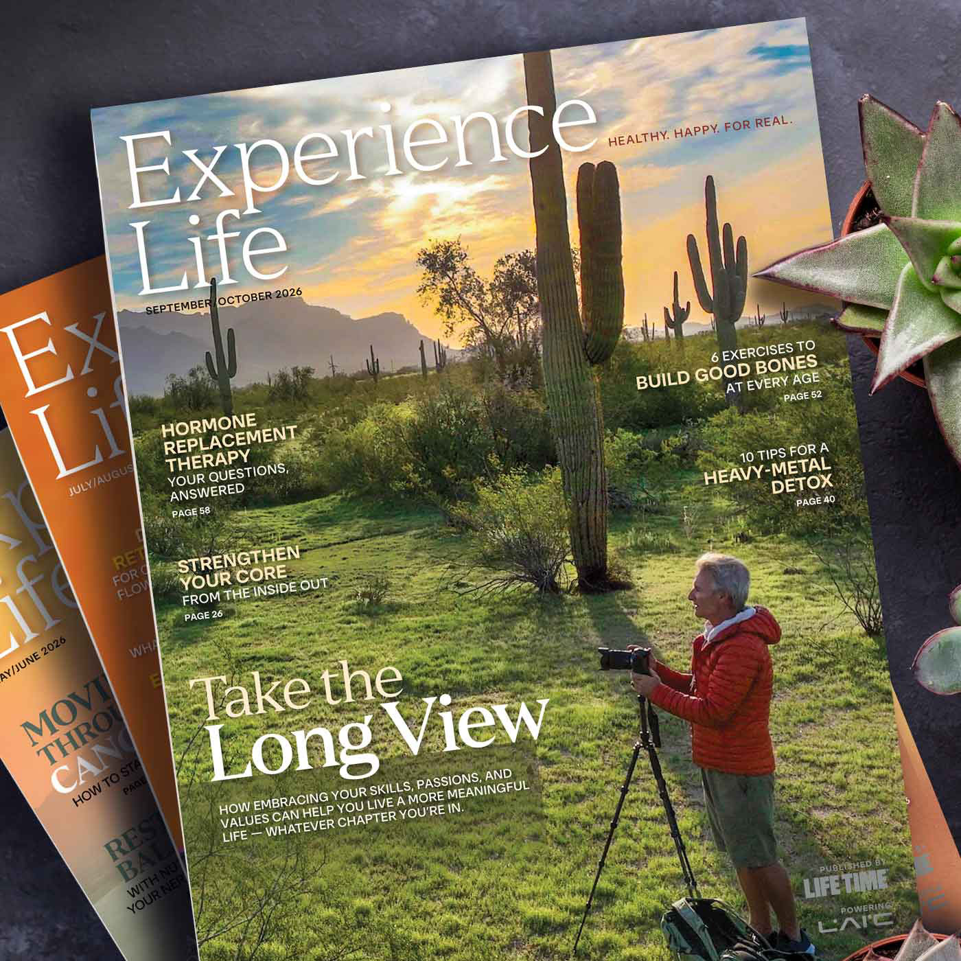 Sept/Oct 2026 cover of Experience Life with person taking picture in cactus field
