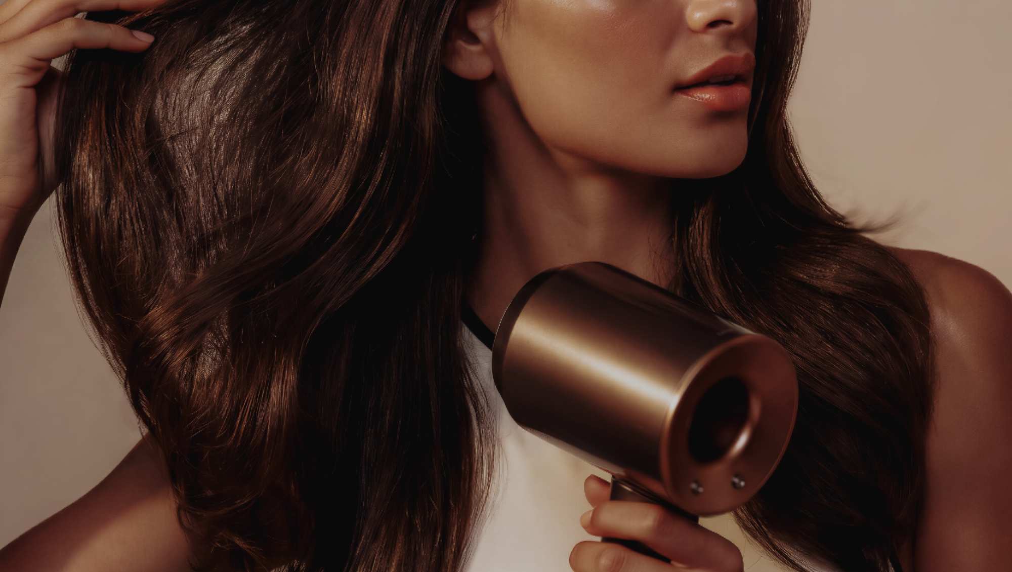 Person blow drying their hair