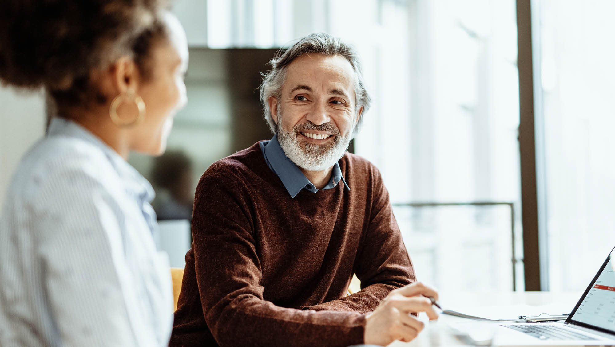 a middle age man in a corporate setting