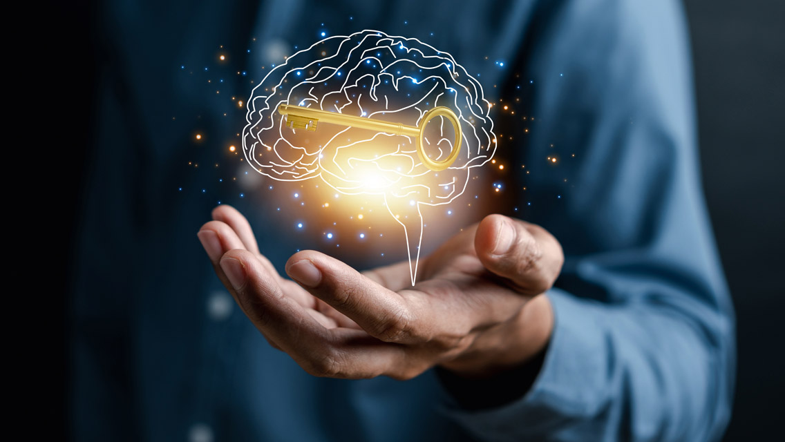 illustration of a brain with a key in it hovering over a hand