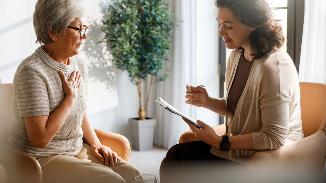 a patient talks with a clinician