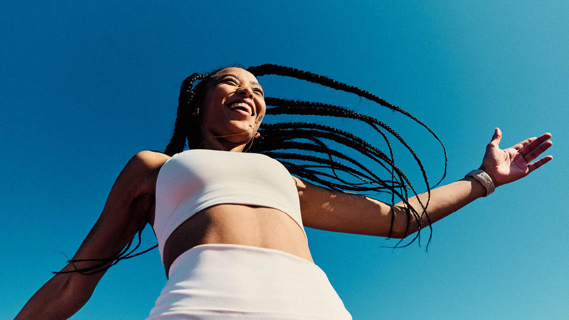 a happy woman outside