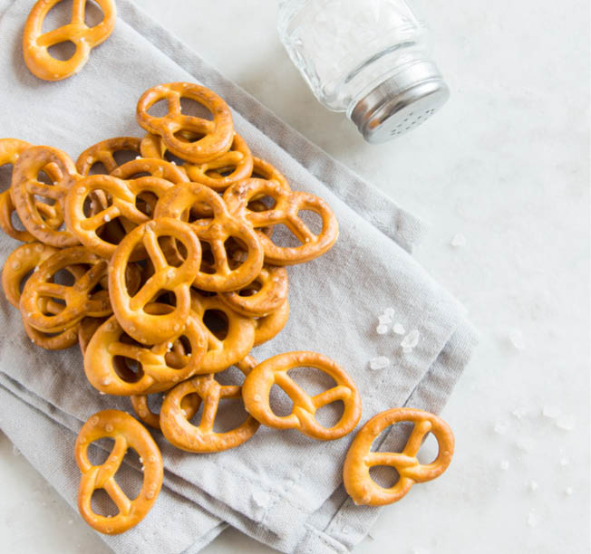Salty Mini Pretzels with Salt in a Bowl - homemade organic snack for beer