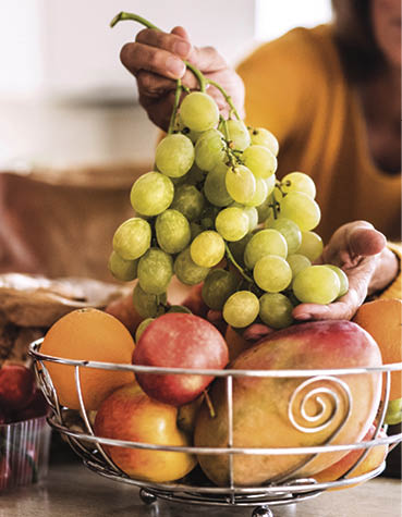 Senior couple preparing food in the kitchen  An old man and woman inside the house 