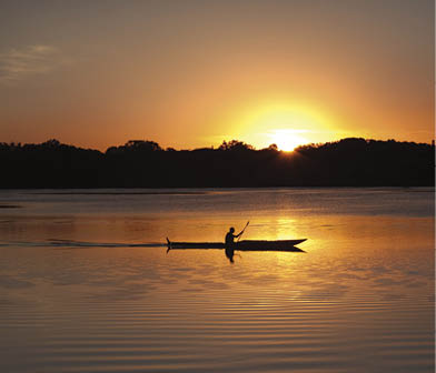  Subject  Kayaking in Lake of the Isles of Minneapolis  Minnesota at sunset Location  Lake of the Isles  Minneapolis  Minnesota  USA  