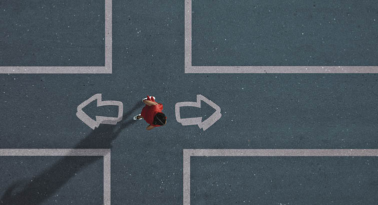 Group of children photographed from above on various painted tarmac surface at sunset