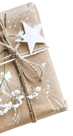 Christmas composition  Christmas gift, pine cones, thuja branches and gypsophila flowers  Top view, flat lay