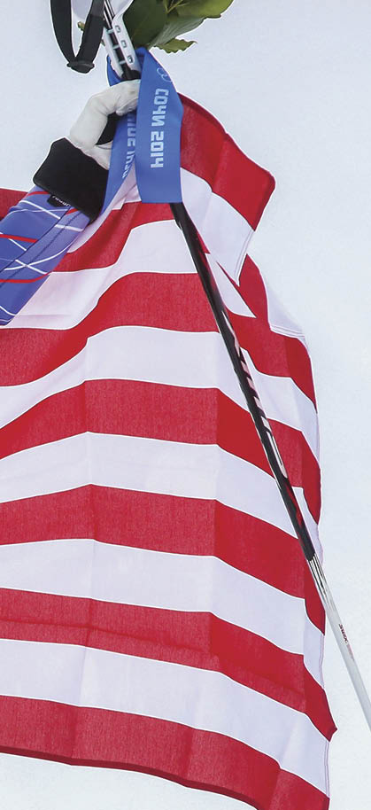 SOCHI, RUSSIA - FEBRUARY 10:  Bronze medalist Julia Mancuso of the United States celebrates after the flower ceremony for the Alpine Skiing Women's Super Combined on day 3 of the Sochi 2014 Winter Olympics at Rosa Khutor Alpine Center on February 10, 2014 in Sochi, Russia.  (Photo by Alexander Hassenstein/Getty Images)