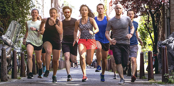 Urban runners crew training in the city in Amsterdam, Netherlands.