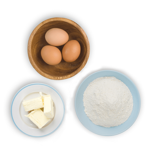 Collection of various cake baking ingredients isolated on white background