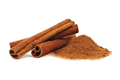 Cinnamon sticks and powder on white background