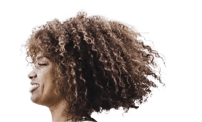 Curvy African American Woman Skipping Rope In Urban Area