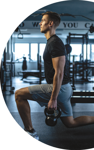 Young man Practicing Walking lunge with Kettle bell