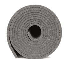 Rolled up yoga mat isolated on white