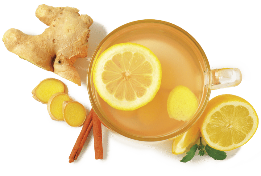 cup of ginger tea with lemon  fresh ginger root and cinnamon sticks on white background