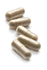 Herb capsules for Health on white background