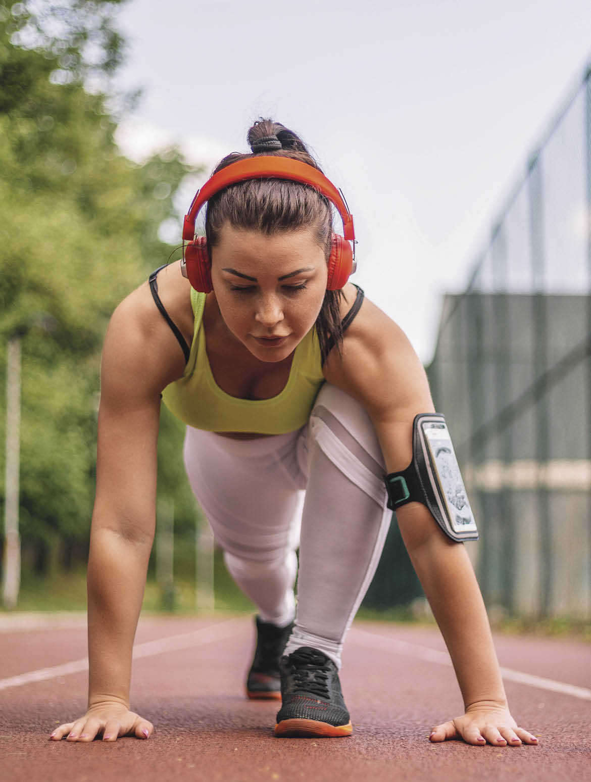 Athlete prepares for a morning jogging on the track running