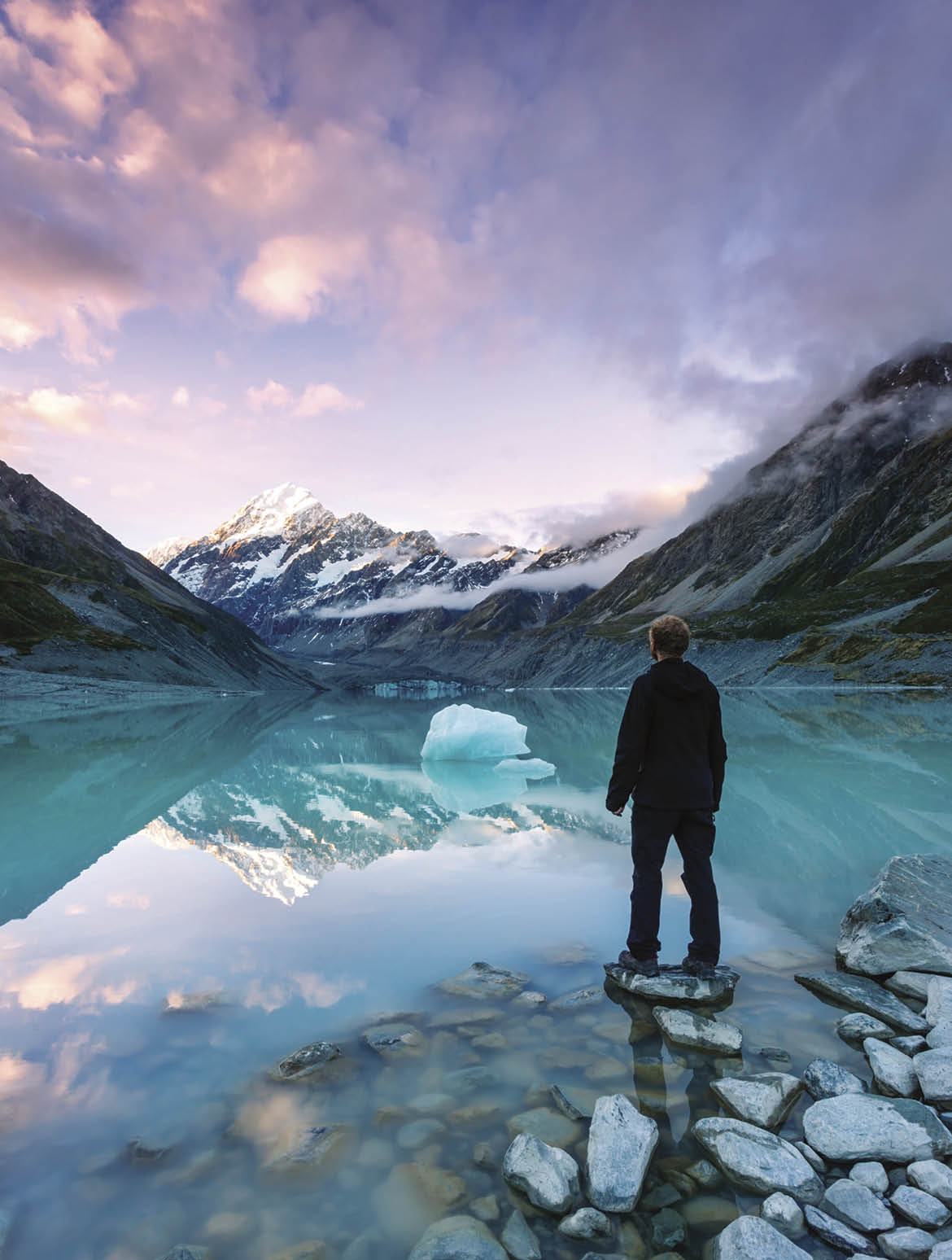 Hiker looking at Mt Cook  Hooker lake  New Zealand