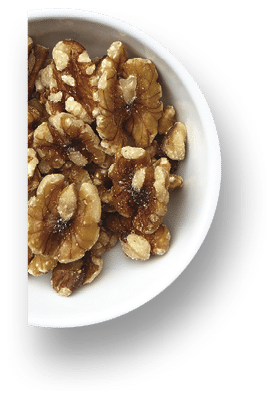 A grouping of various super foods  Blueberries, chia, apples, grapes, spinach, tomatoes, grapes, cashews, pepitas, sunflower seeds, walnuts, kiwi, oatmeal