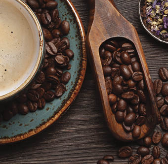 Various herbal tea and espresso coffee on wooden table  Top view with copy space  Flat lay