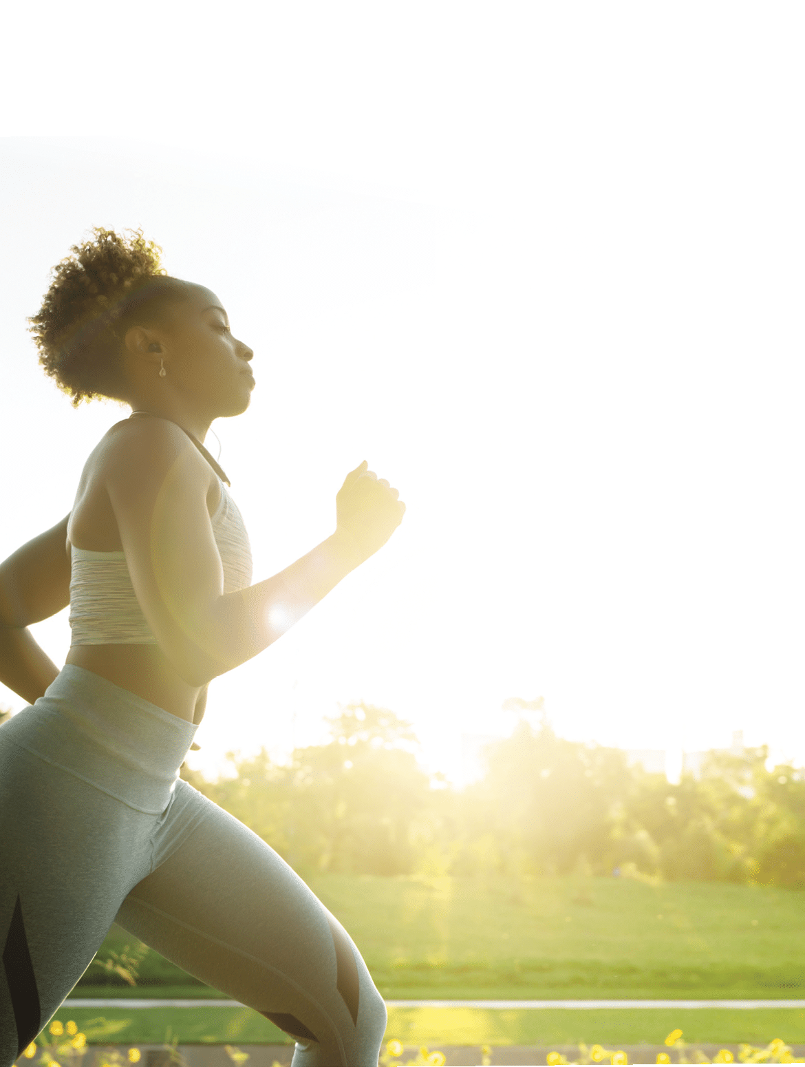 Mixed Race woman running in park