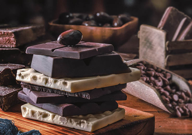 Assorted chocolate, nuts and dried fruit in old fashioned style