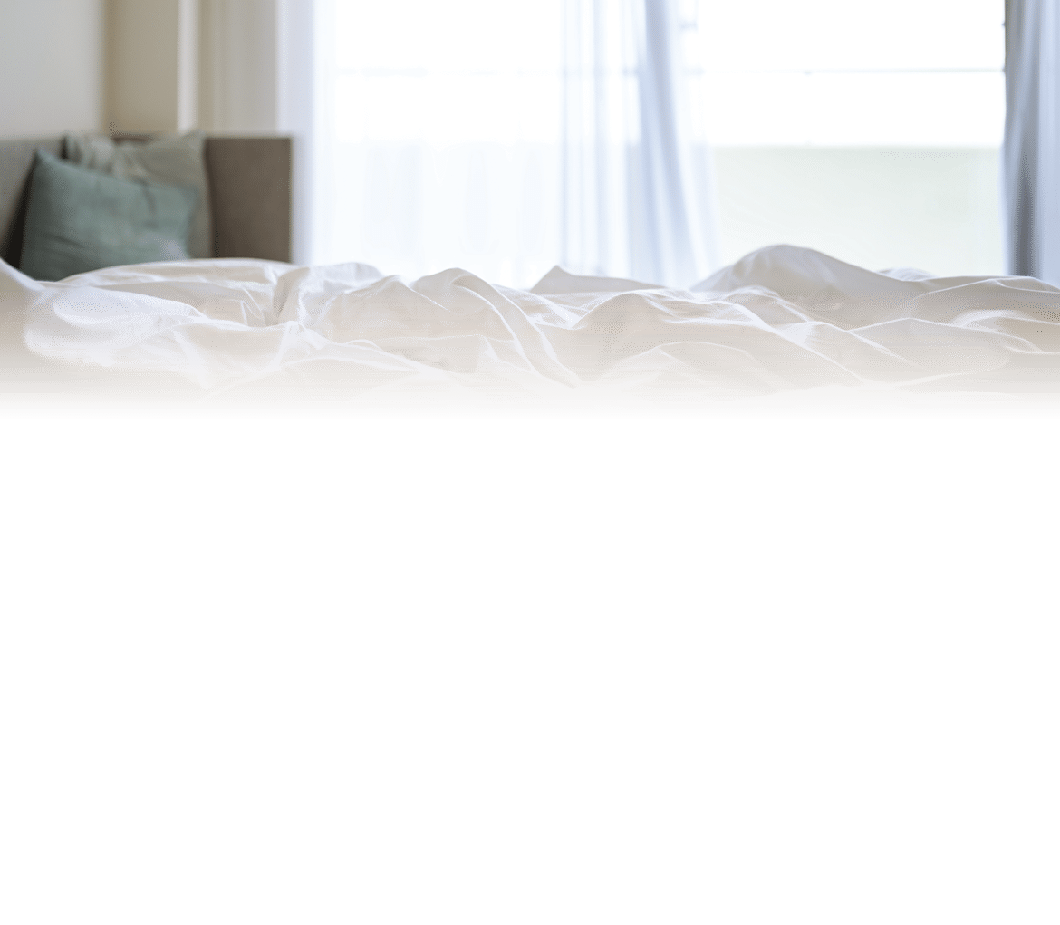 Morning sunshine on the bed through the window